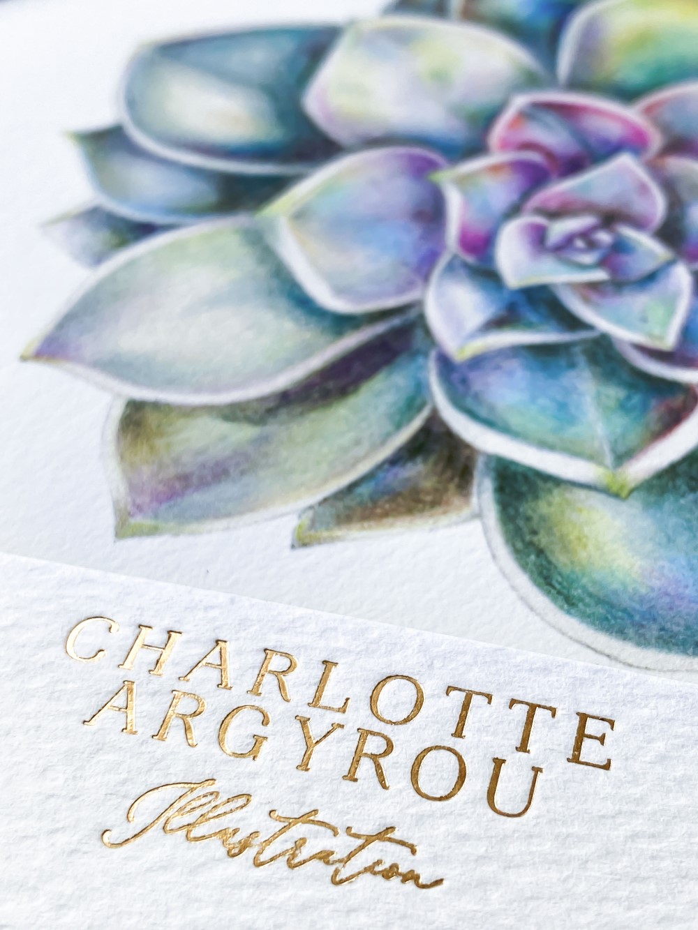2020-07_charlotte close up_ria-mishaal-photography lo Charlotte Argyrou Illustration gold foil letterpress logo